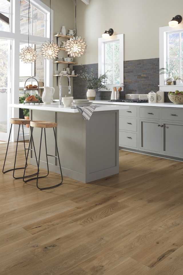 light white oak in contemporary kitchen with wall to ceiling windows and accent lighting